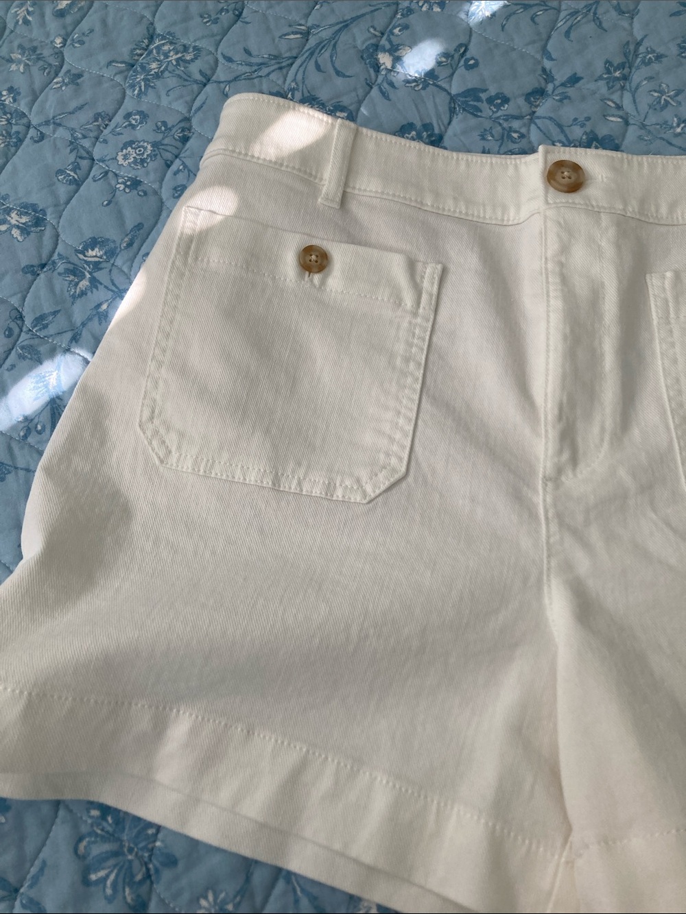 LOFT White High-Rise Cotton Jean Shorts with Front Patch Pockets.